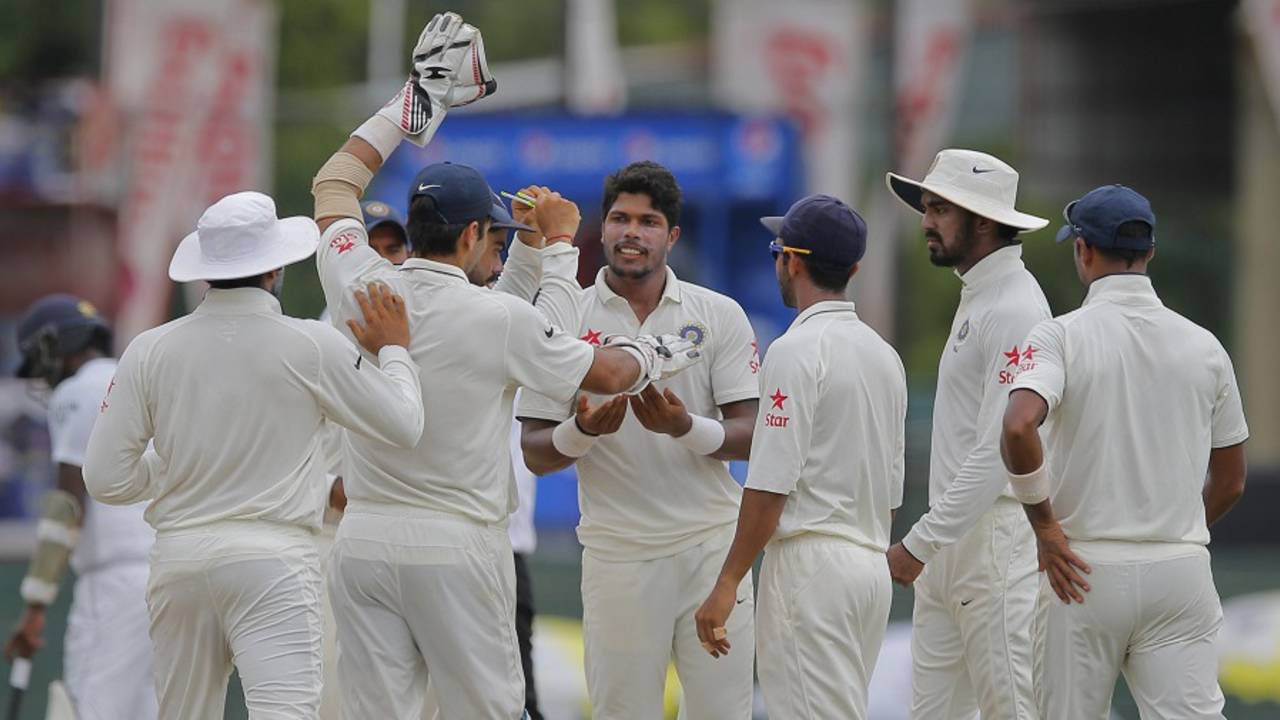 Umesh Yadav is congratulated by his teammates for dismissing Kaushal Silva, Sri Lanka v India, 3rd Test, SSC, Colombo, 5th day, September 1, 2015
