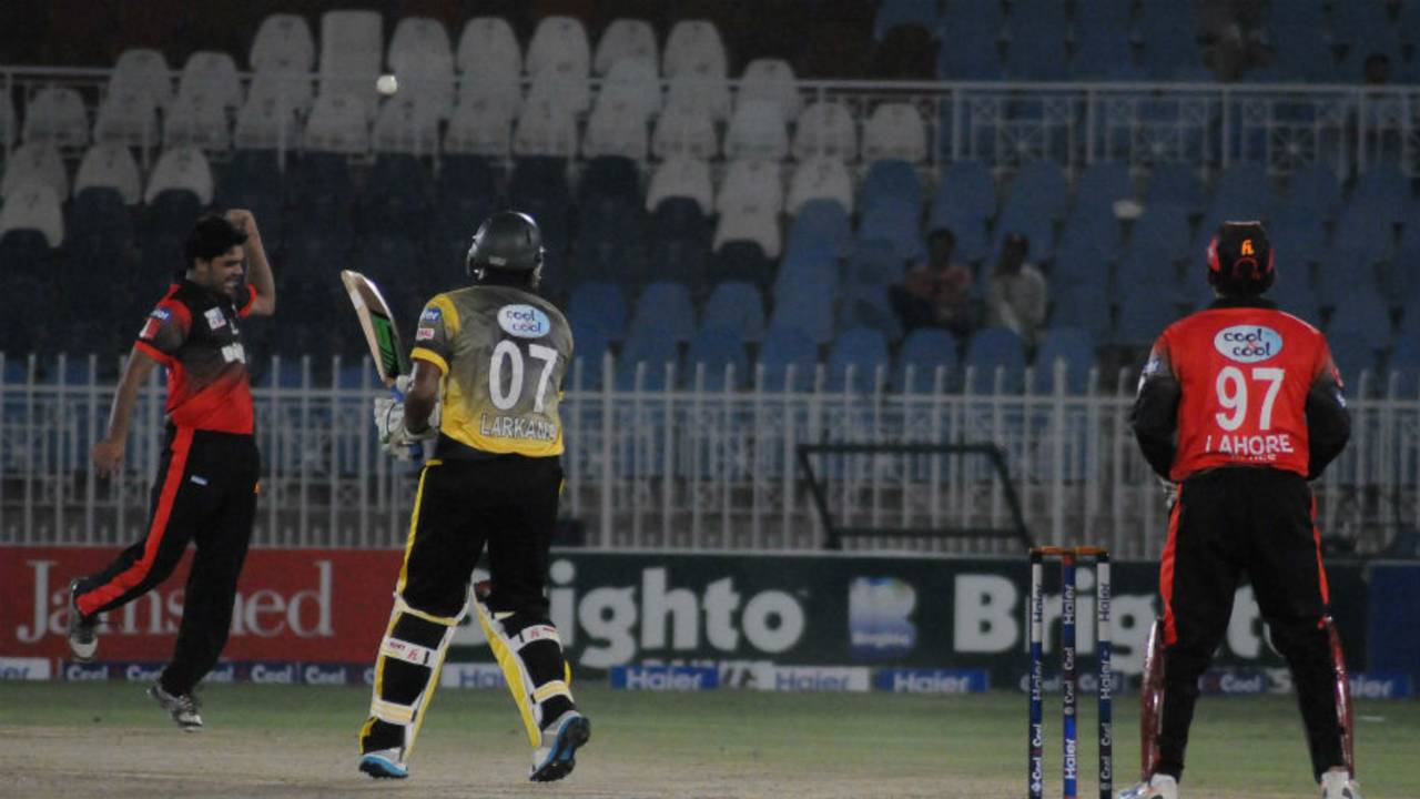 Mohammad Waheed takes a return catch to dismiss Zafar Ali, Qualifying Round, Group A, Lahore Region Blues v Larkana Region, Rawalpindi, September 4, 2015