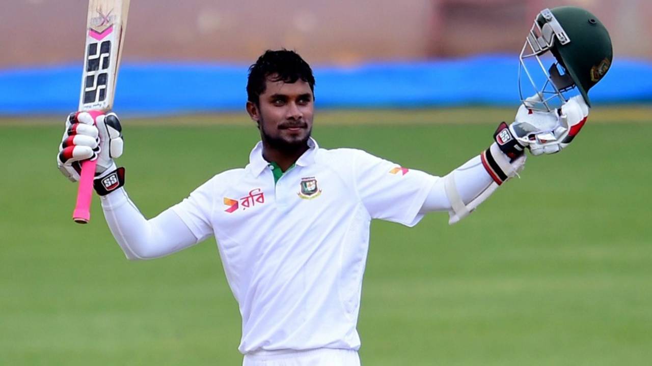 Sabbir Rahman raises his bat after reaching a century,  India A v Bangladesh A, 1st day, Bangalore, September 27, 2015