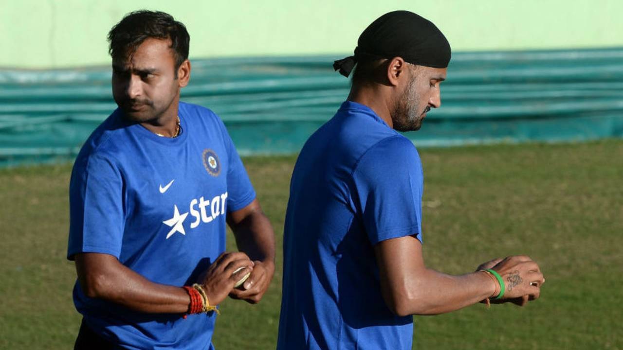 Amit Mishra (left) might have posed a greater threat to South Africa in Dharamsala&nbsp;&nbsp;&bull;&nbsp;&nbsp;AFP