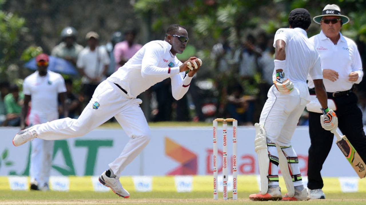 Marlon Samuels held onto a return catch to dismiss Dimuth Karunaratne, Sri Lanka v West Indies, 1st Test, Galle, 2nd day, October 15, 2015