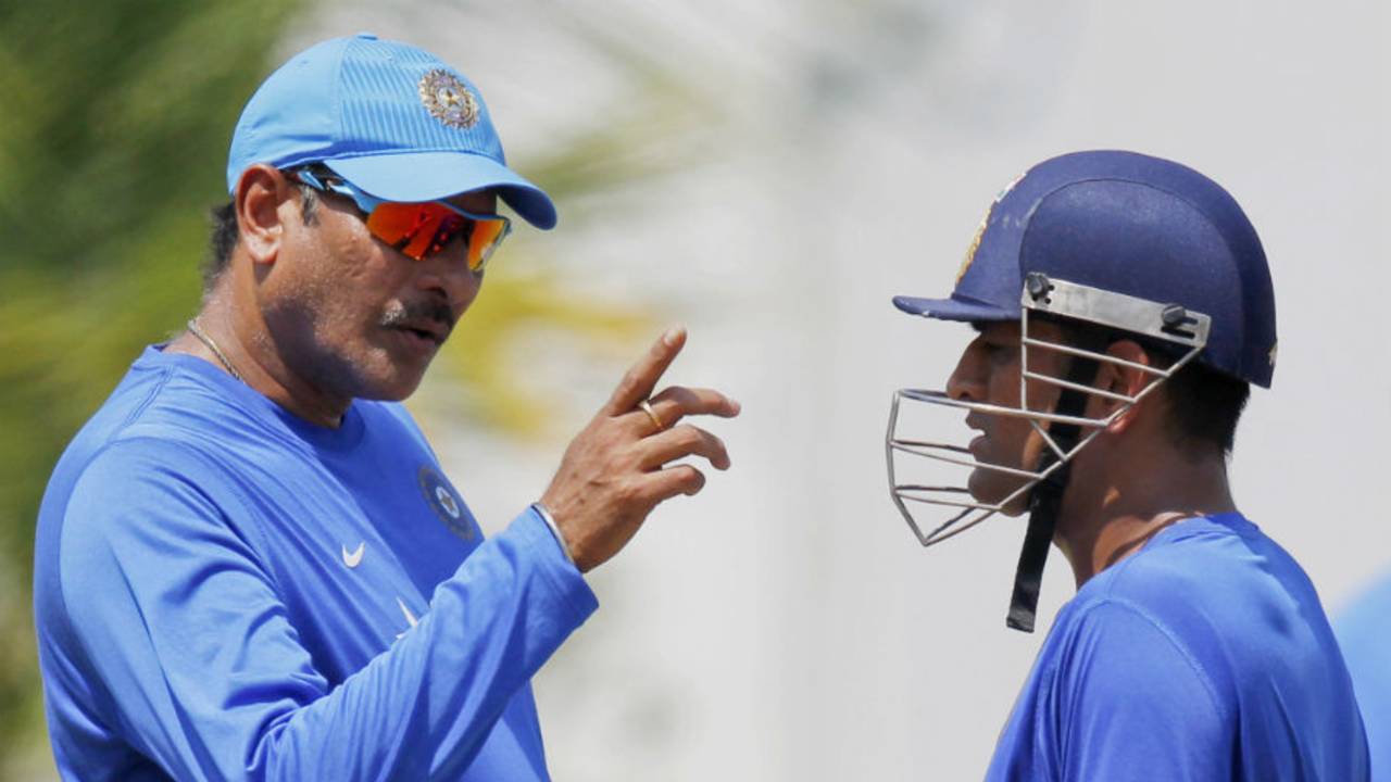 Ravi Shastri and MS Dhoni chat during a training session&nbsp;&nbsp;&bull;&nbsp;&nbsp;Associated Press