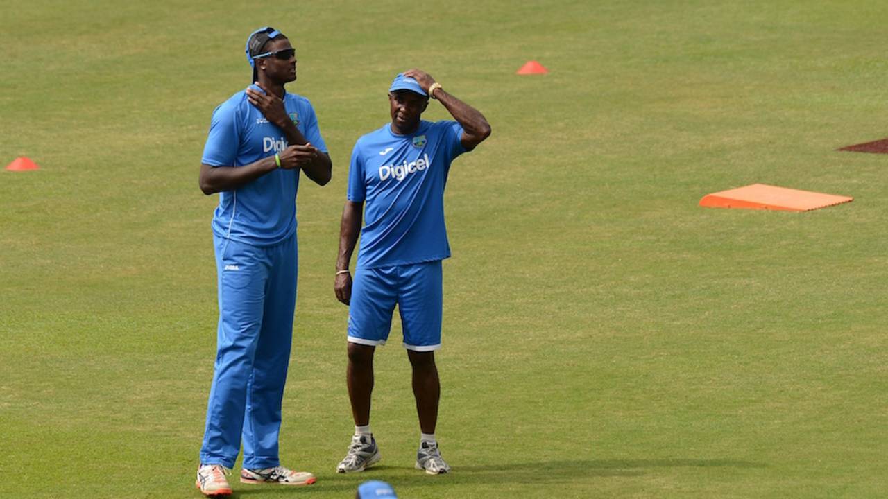 West Indies coach Eldine Baptiste and captain Jason Holder have a chat, Sri Lanka v West Indies, 1st ODI, Colombo, November 1, 2015 