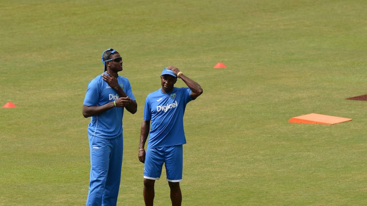 West Indies coach Eldine Baptiste and captain Jason Holder have a chat
