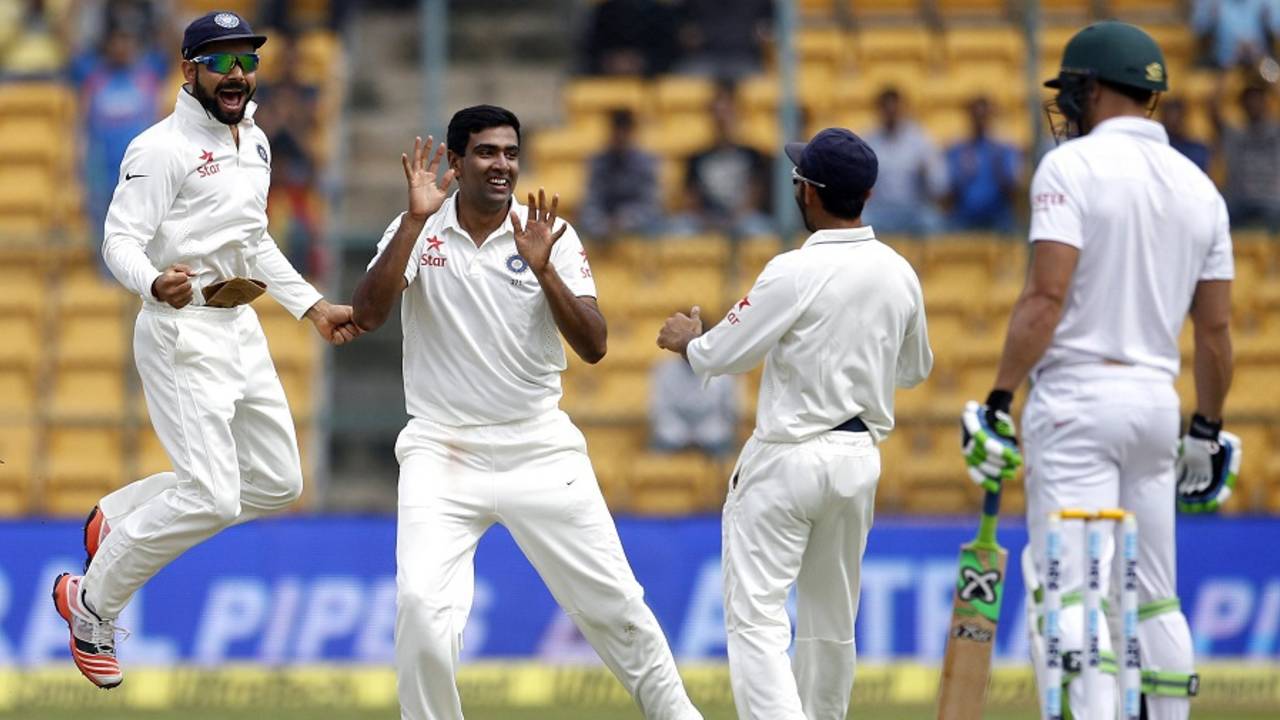 Virat Kohli and R Ashwin celebrate Faf du Plessis' dismissal, India v South Africa, 2nd Test, 1st day, Bangalore, November 14, 2015