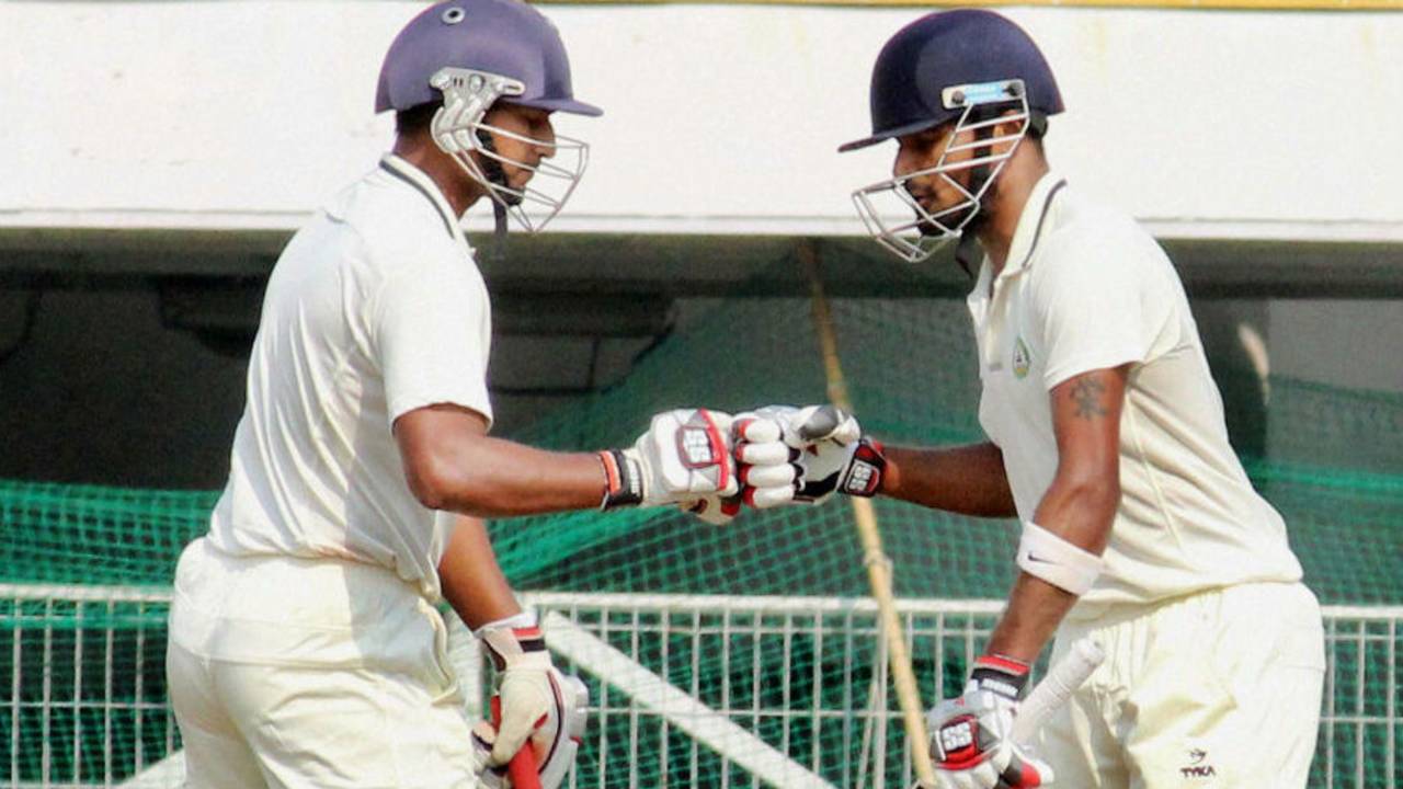 Ganesh Satish and S Badrinath punch gloves during their 127-run stand, Vidarbha v Rajasthan, Group A, Ranji Trophy 2015-16, Nagpur, 4th day, November 18, 2015