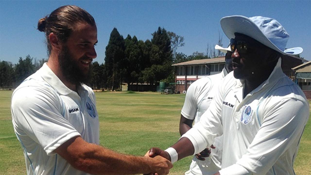 Kyle Bowie is presented his cap on first-class debut for Matabeleland Tuskers,  Mashonaland Eagles v Matabeleland Tuskers, Logan Cup, Harare, 1st day November 25 2015