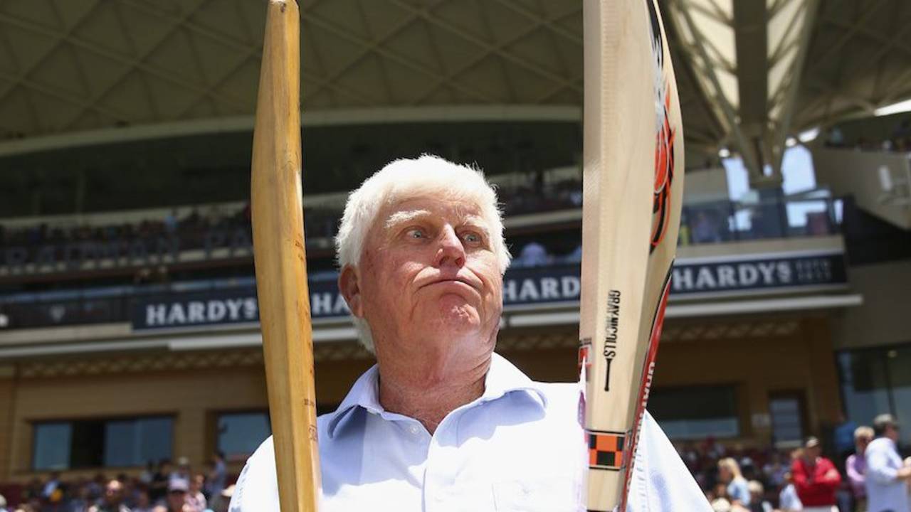 Barry Richards holds the bat with which he made 325 in a day at the WACA in 1970 in his right hand, and David Warner's modern-day weapon in his left&nbsp;&nbsp;&bull;&nbsp;&nbsp;Cricket Australia