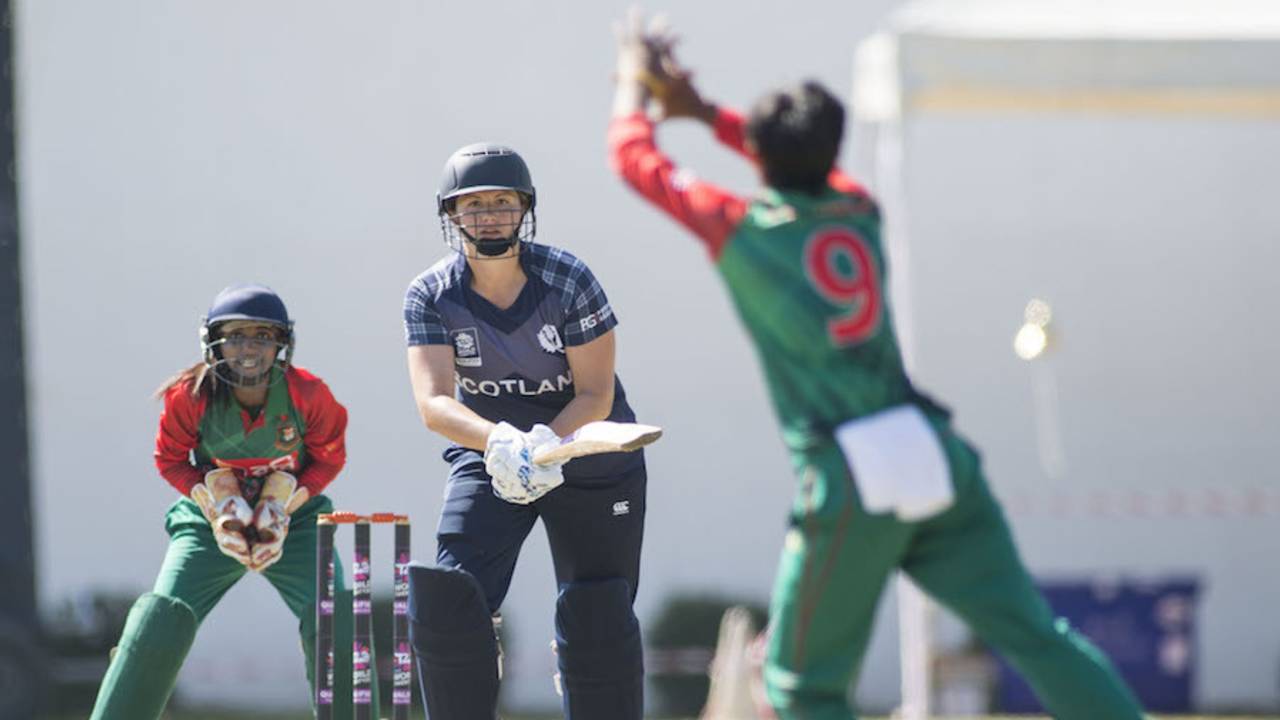Fiona Urquhart strikes the ball back to Fahima Khatun, Bangladesh v Scotland, ICC Women's World Twenty20 Qualifier, Bangkok, November 29, 2015
