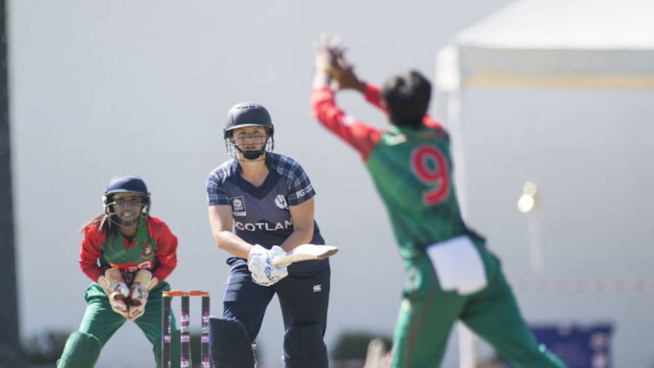 Fiona Urquhart strikes the ball back to Fahima Khatun, Bangladesh v Scotland, ICC Women's World Twenty20 Qualifier, Bangkok, November 29, 2015