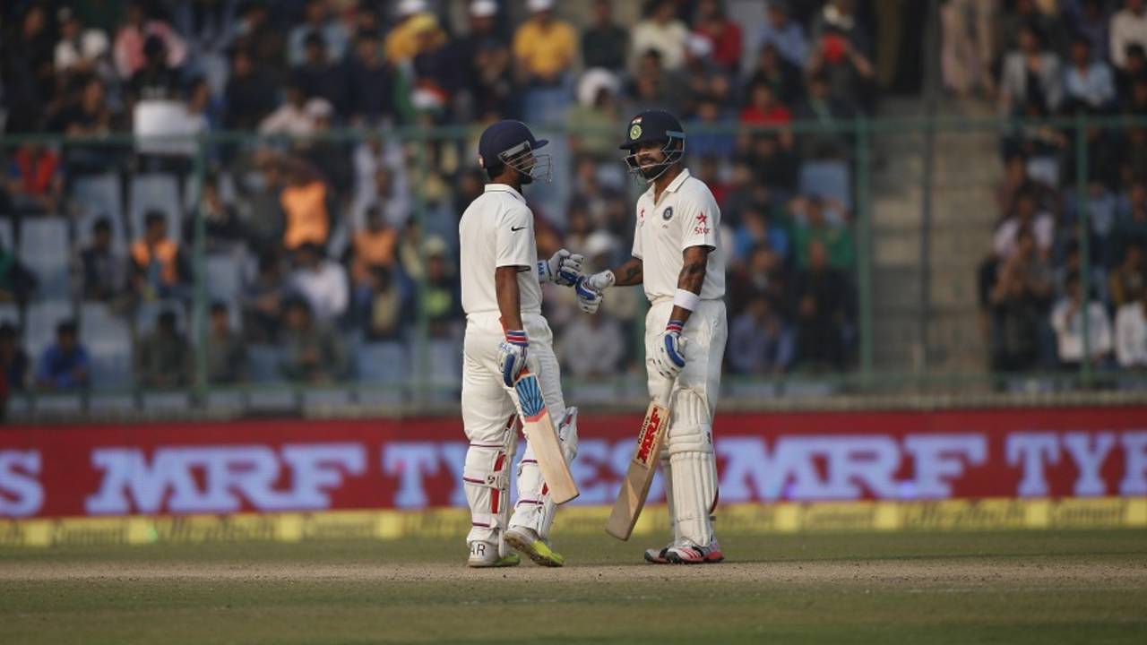 Virat Kohli and Ajinkya Rahane touch gloves during their counterattacking partnership, India v South Africa, 4th Test, Delhi, 3rd day, December 5, 2015