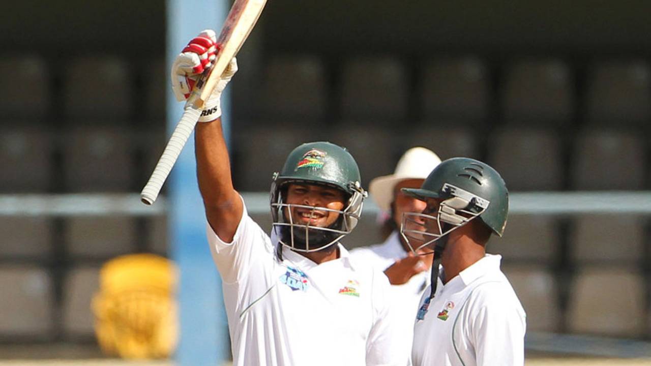 Assad Fudadin raises his bat after reaching his century, Trinidad & Tobago v Guyana, Regional Four-Day Tournament, 3rd day, Port-of-Spain, December 6, 2015