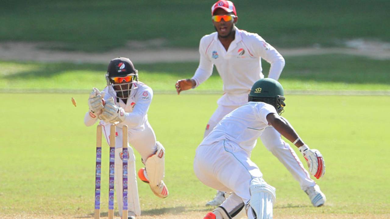 Steven Katwaroo whips the bails off as Raymon Reifer is stumped, Trinidad & Tobago v Guyana, Regional Four-Day Tournament, 3rd day, Port-of-Spain, December 6, 2015