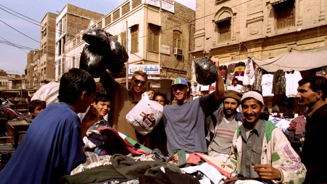 Fanie de Villiers and Steve Palframan shop in a street in Pakistan, February, 1996