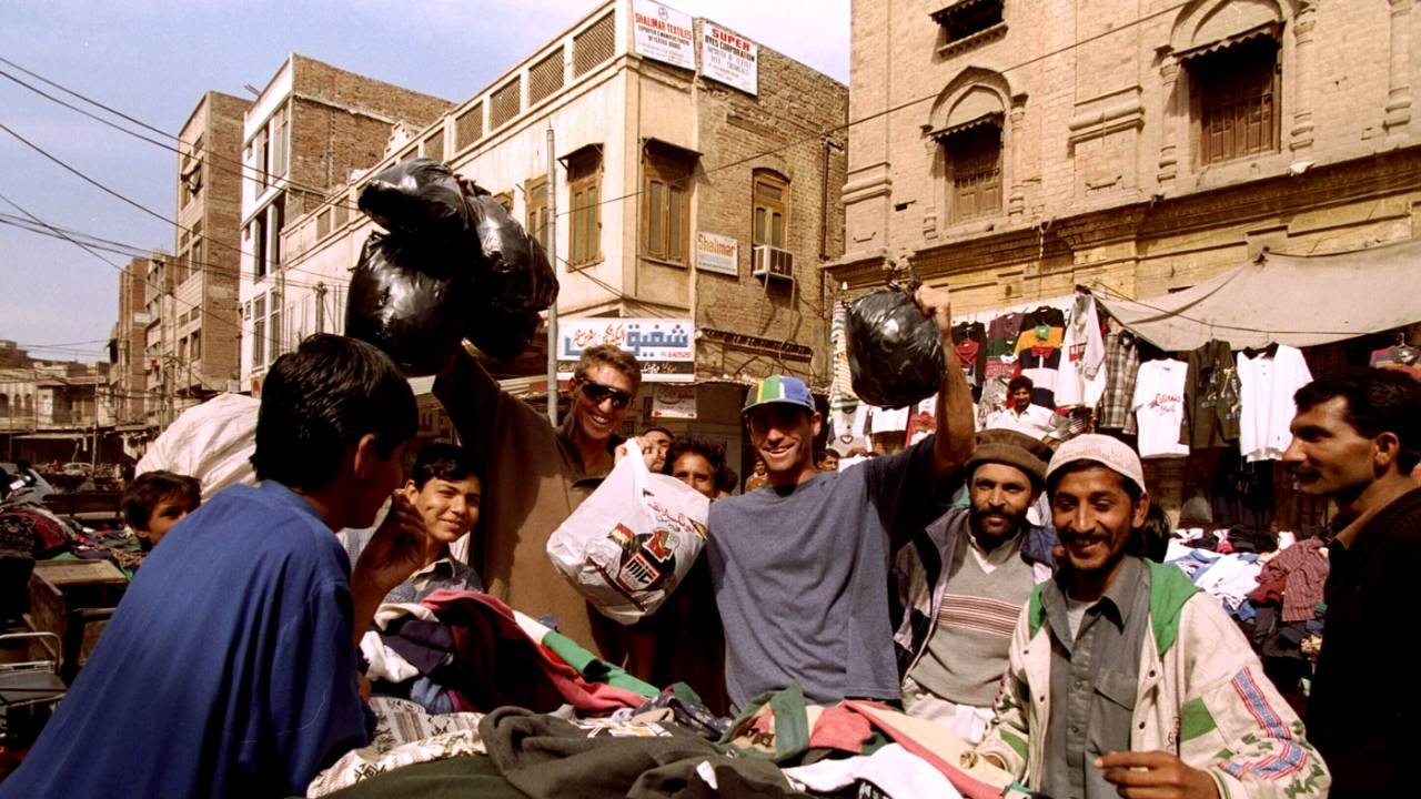 Fanie de Villiers and Steve Palframan shop in a street in Pakistan, February, 1996