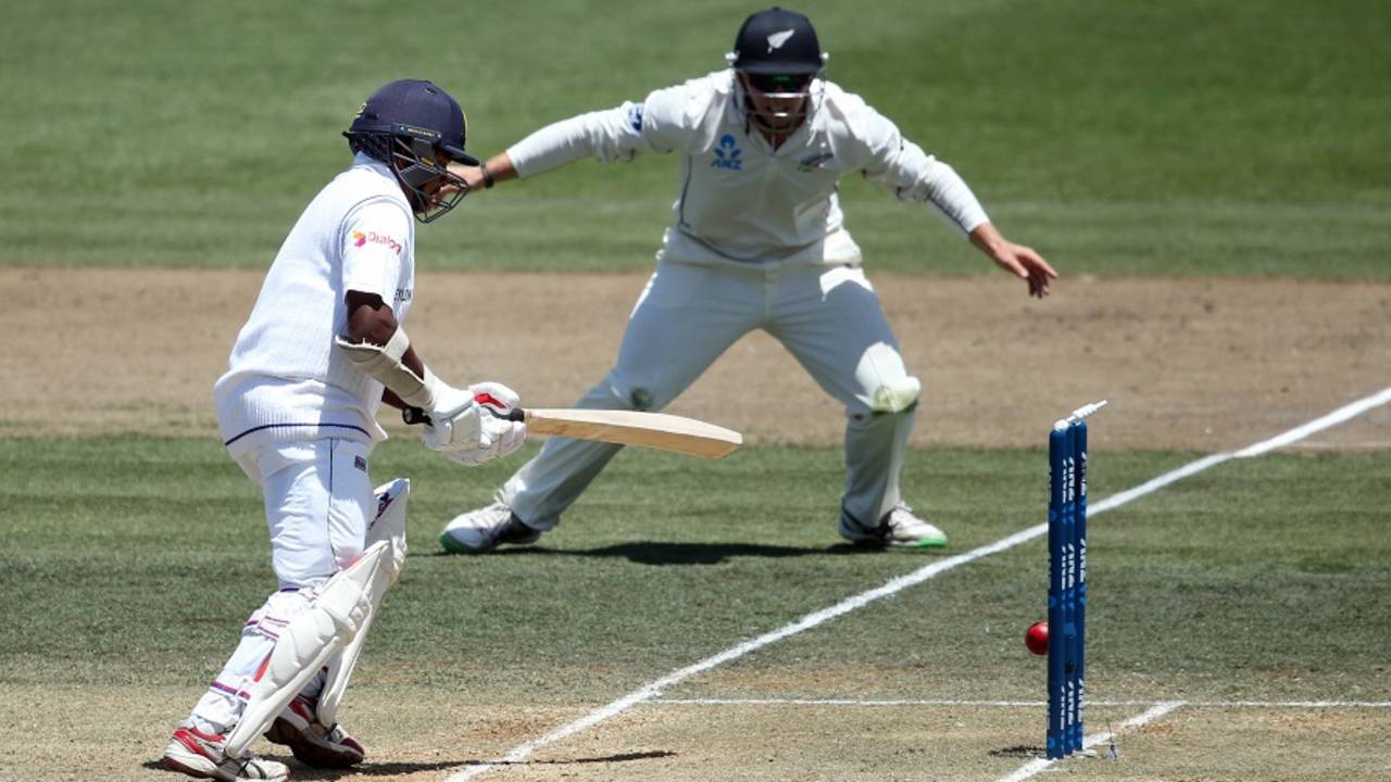 Rangana Herath watches the ball dislodge his leg stump bail, New Zealand v Sri Lanka, 2nd Test, Hamilton, 3rd day, December 20, 2015