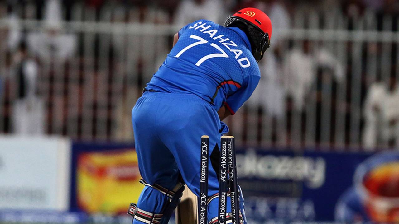 Mohammad Shahzad's stumps were rattled by Luke Jongwe, Afghanistan v Zimbabwe, 5th ODI, Sharjah, January 6, 2016