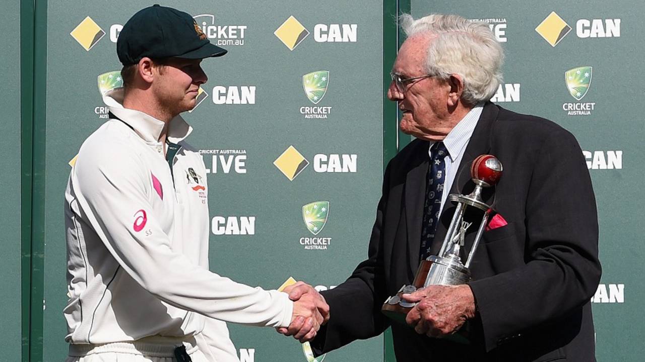 Steven Smith is congratulated by Alan Davidson before receiving the Frank Worrell Trophy, Australia v West Indies, 3rd Test, Sydney, 5th day, January 7, 2016
