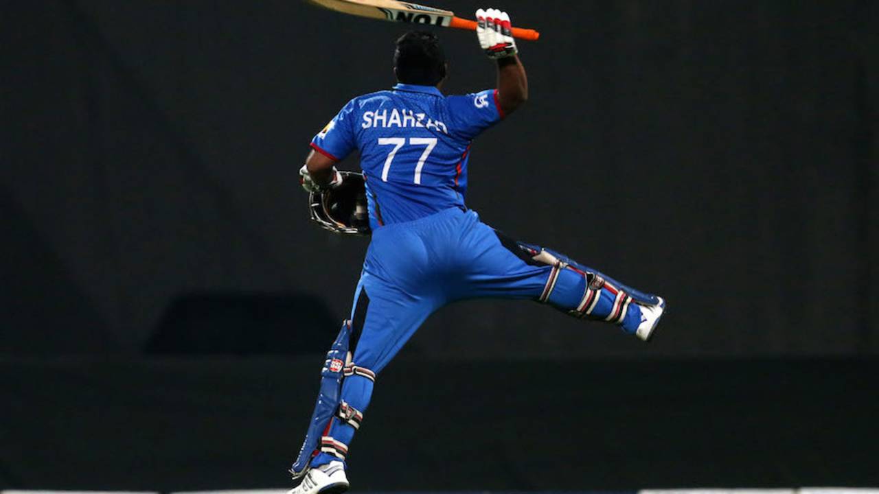 Mohammad Shahzad leaps with joy for his 52-ball hundred, Afghanistan v Zimbabwe, 2nd T20I, Sharjah, January 10, 2016