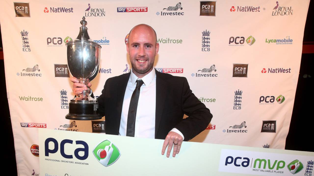 Chris Rushworth, the PCA Player of the Year, holds up the Reg Hayter Cup, London, September 29, 2015  29