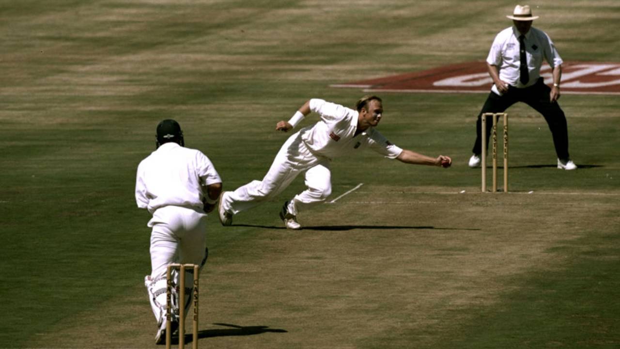 Brett Schultz fields the ball off his own bowling, South Africa v Australia, 3rd Test, Centurion, March 1997 