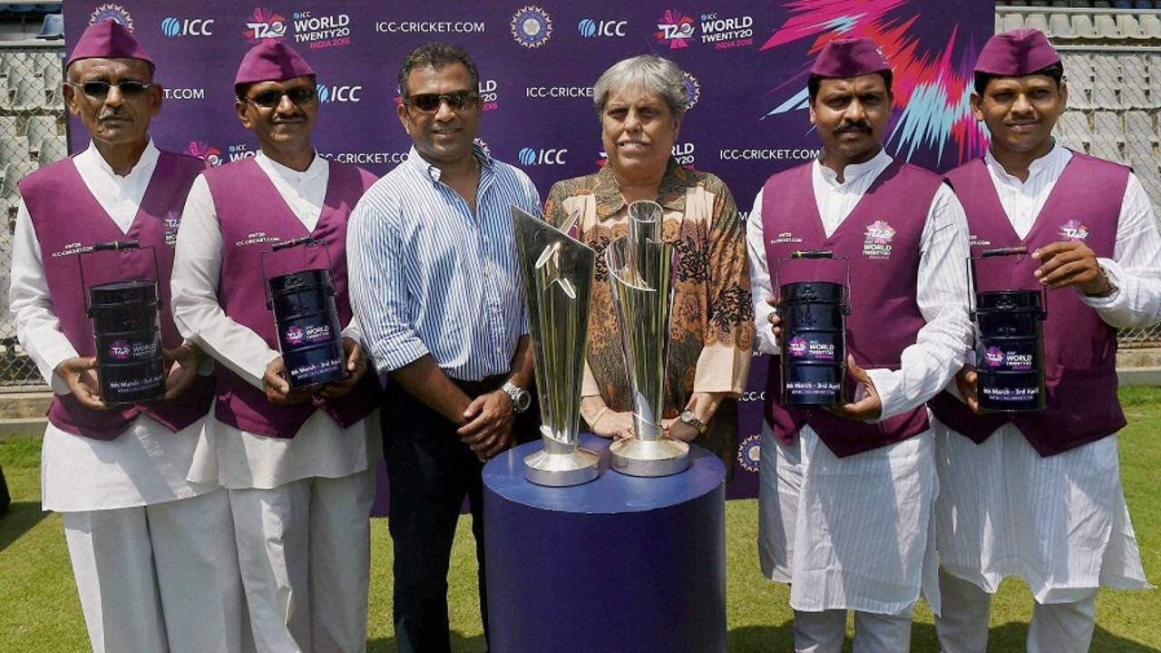 Former India cricketers Sameer Dighe and Diana Edulji  and Mumbai dabbawalas pose with the World T20 trophies&nbsp;&nbsp;&bull;&nbsp;&nbsp;PTI 