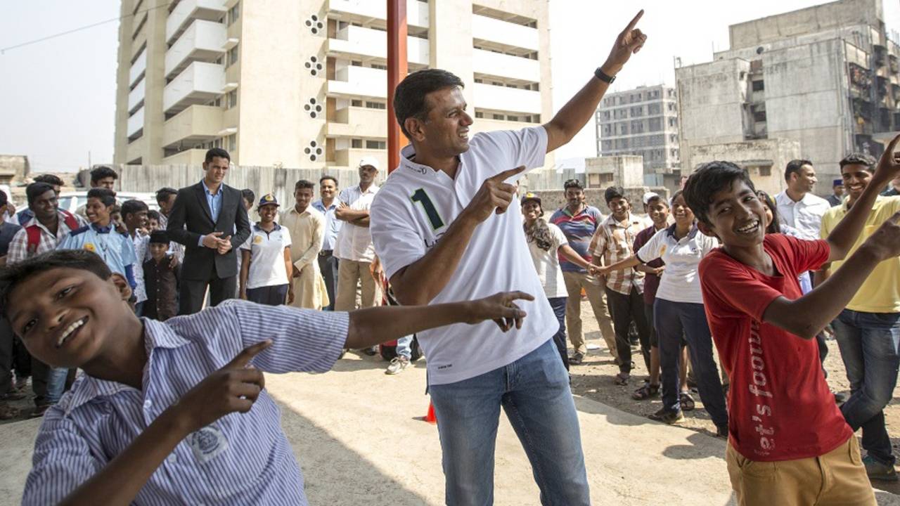 Rahul Dravid poses with children at an event, Mumbai, March 11, 2016