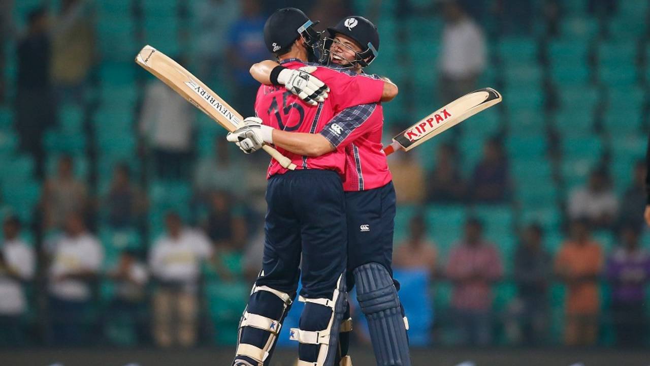 Kyle Coetzer and Matt Machan hug each other after sealing Scotland's win, Hong Kong v Scotland, World T20 qualifiers, Group B, Nagpur, March 12, 2016