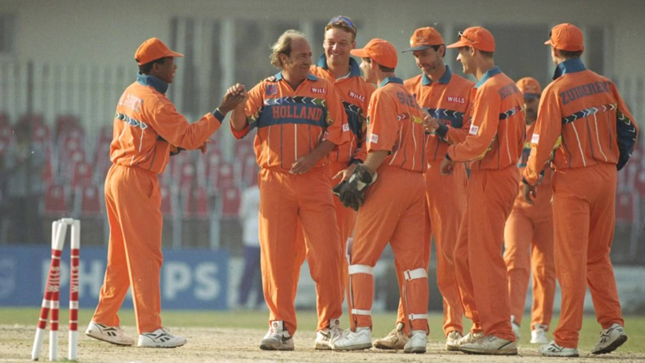 Nolan Clarke congratulates Jan Bakker for his wicket of Alec Stewart, England v Netherlands, Group B, World Cup, Peshawar, February 22, 1996