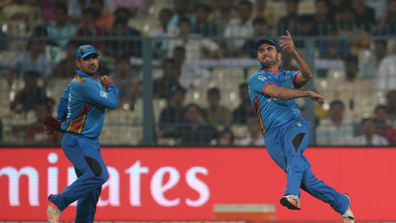 Karim Sadiq throws the ball, Afghanistan v Sri Lanka, World T20 2016, Group 1, Kolkata