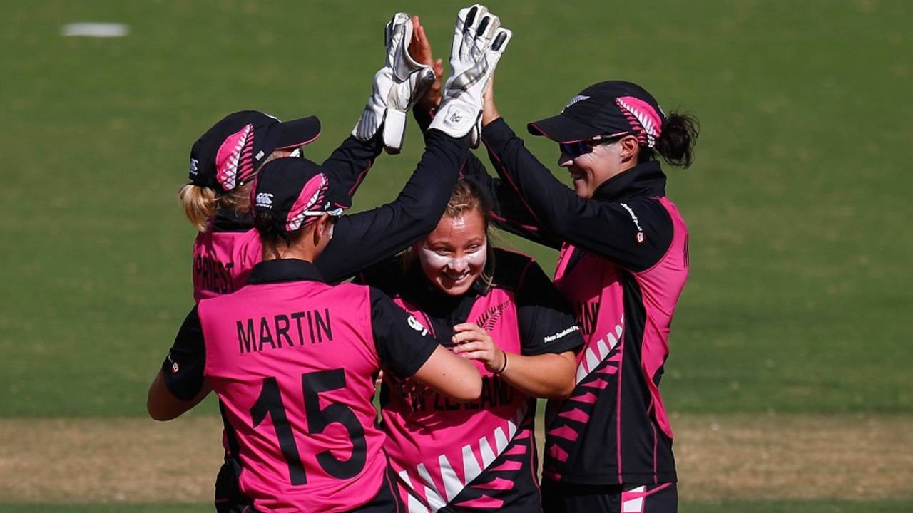Leigh Kasperek is mobbed by her team-mates during her three-wicket haul, Australia v New Zealand, Women's World T20 2016, Group A, Nagpur, March 21, 2016