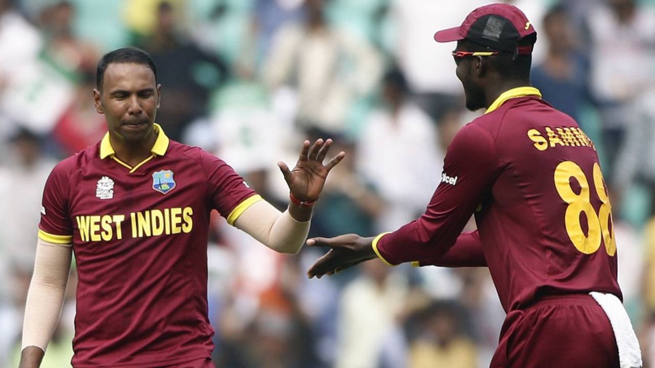 Samuel Badree celebrates a wicket with Darren Sammy, Afghanistan v West Indies, World T20 2016, Group 1, Nagpur, March 27, 2016