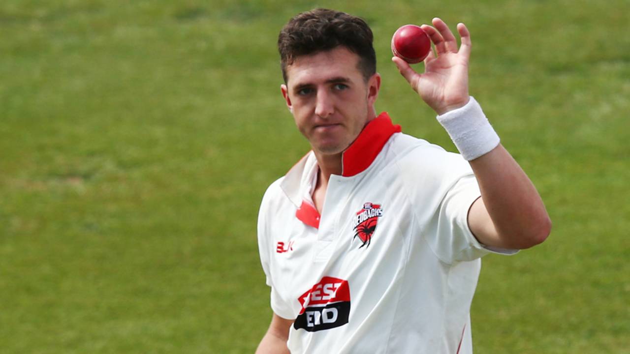 Daniel Worrall holds up the ball to the crowd after taking 6 for 96, South Australia v Victoria, Sheffield Shield Final, Adelaide, third day, March 28, 2016