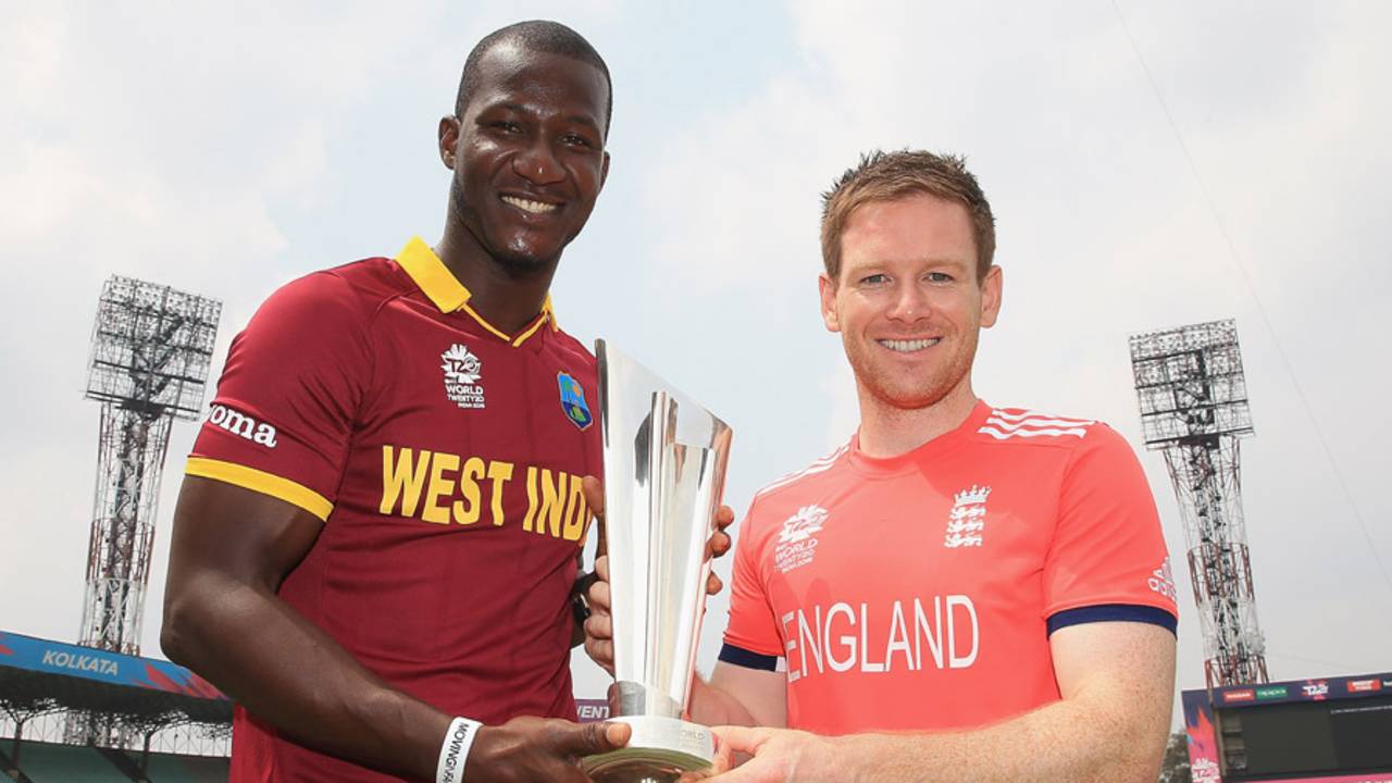 Darren Sammy and Eoin Morgan with the World T20 trophy, Kolkata, April 2, 2016