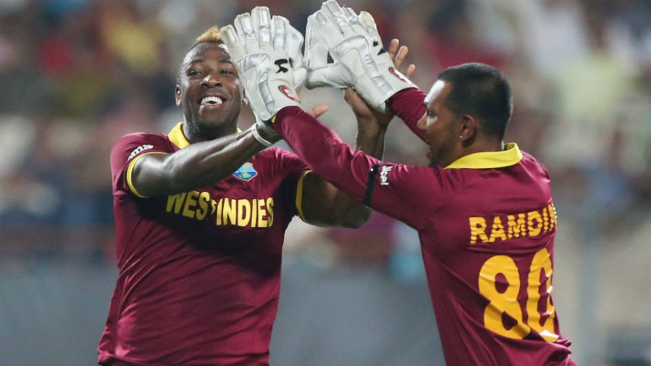 Andre Russell and Denesh Ramdin celebrate the wicket of Alex Hales, England v West Indies, World T20, final, Kolkata, April 3, 2016
