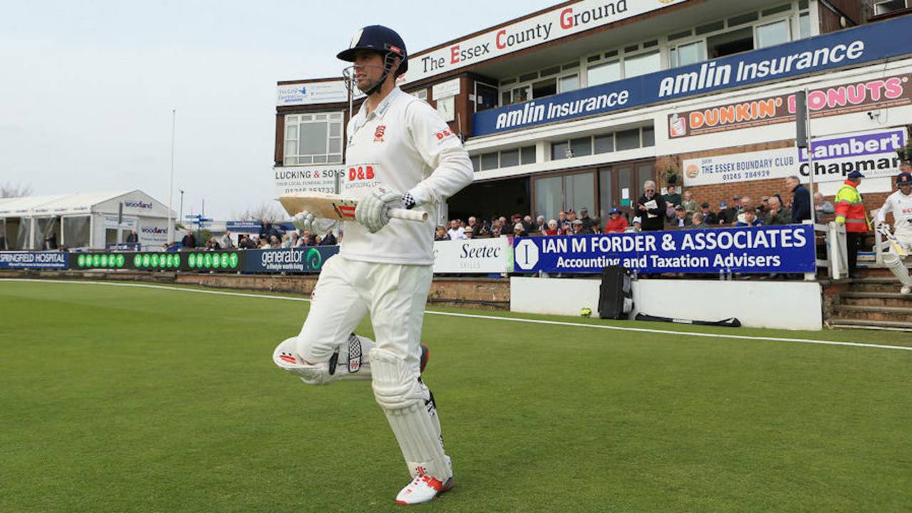 Alastair Cook strides out to bat at Chelmsford wearing his old, non-compliant England helmet&nbsp;&nbsp;&bull;&nbsp;&nbsp;Getty Images