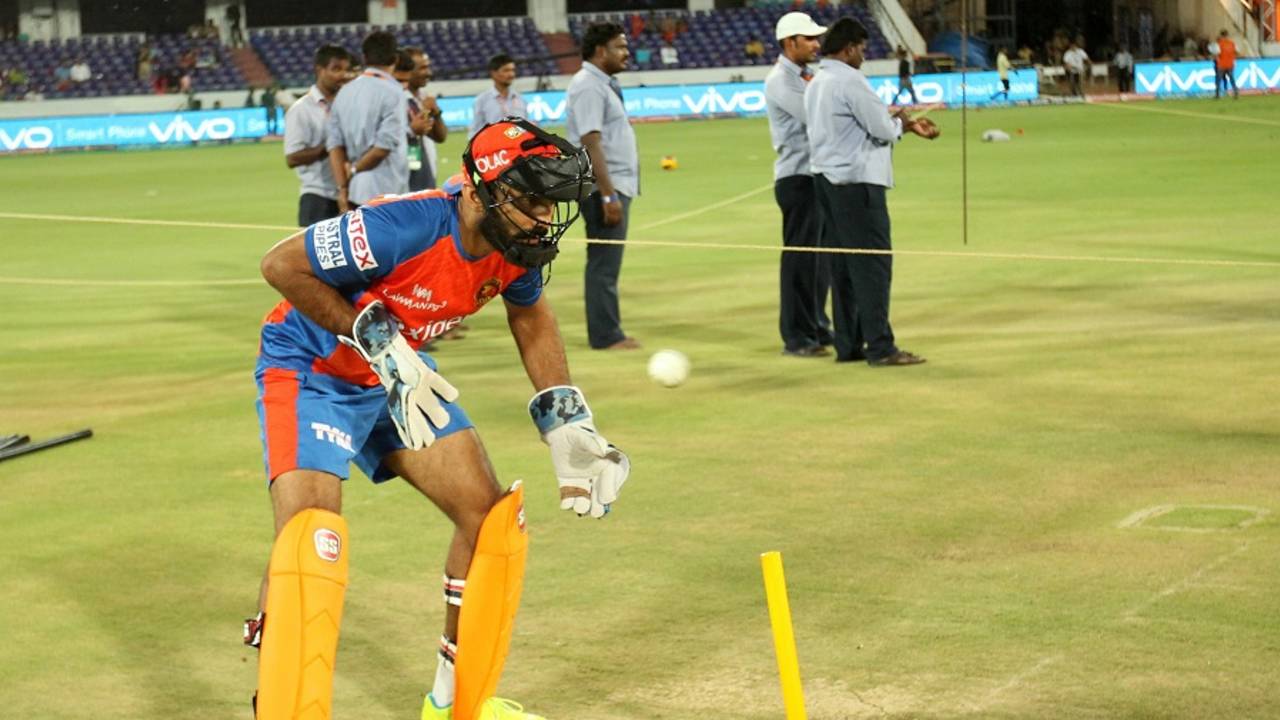 Dinesh Karthik goes through the paces during warm-up, Sunrisers Hyderabad v Gujarat Lions, IPL 2016, Hyderabad, May 6, 2016