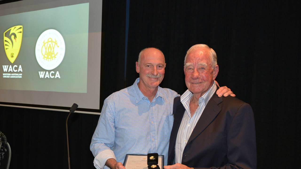 Keith Slater, a former Western Australia allrounder and Test player, receives an honorary life membership of the WACA from Dennis Lillee
