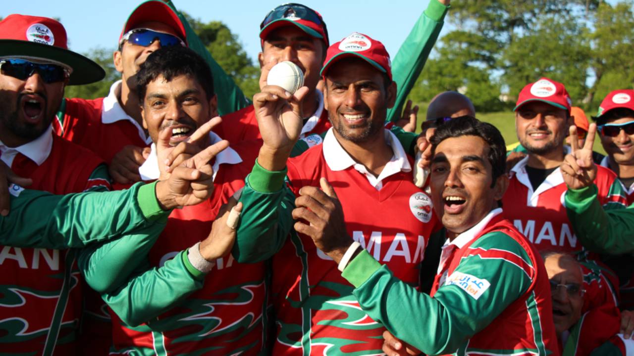 Munis Ansari is the center of the victory celebrations after taking career-best figures of 5 for 27, Jersey v Oman, ICC World Cricket League Division Five, St Saviour, May 23, 2016