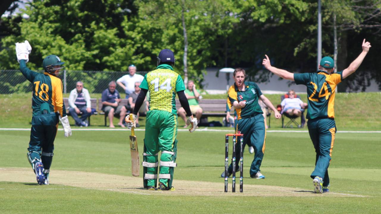 Max Ellis celebrates his third wicket with another catch at slip by Thomas Kirk (24), Guernsey v Nigeria, ICC World Cricket League Division Five, St Saviour, May 24, 2016