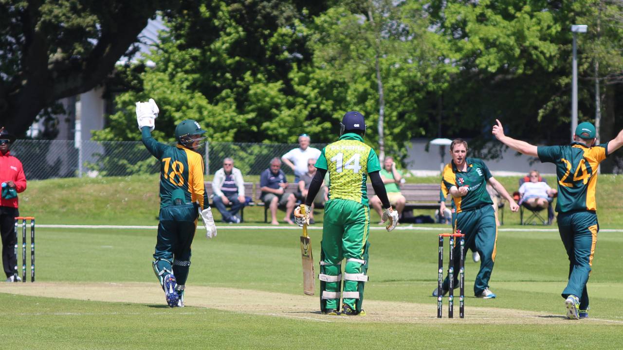 Max Ellis celebrates his third wicket with another catch at slip by Thomas Kirk (24), Guernsey v Nigeria, ICC World Cricket League Division Five, St Saviour, May 24, 2016