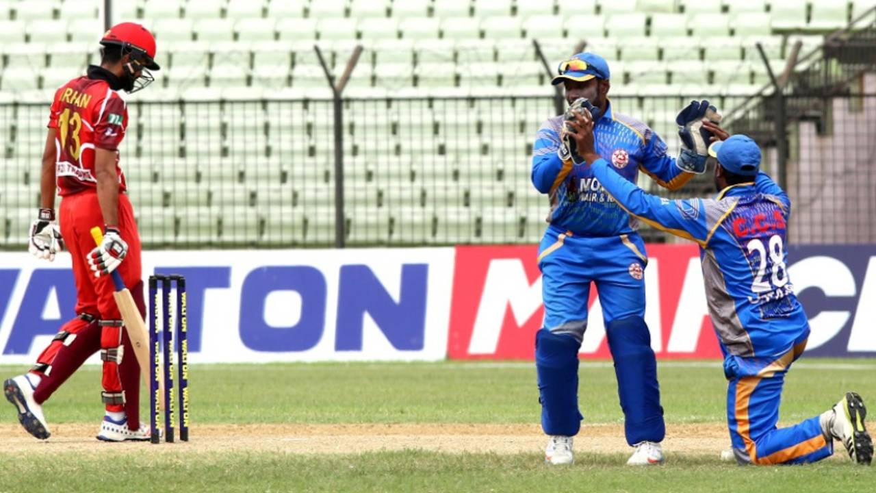 CCS wicketkeeper Ashrafun Nabi celebrates the dismissal of Irfan Sukkur with a team-mate, Kalabagan Cricket Academy v Cricket Coaching School, DPL 2016, Fatullah, June 1, 2016