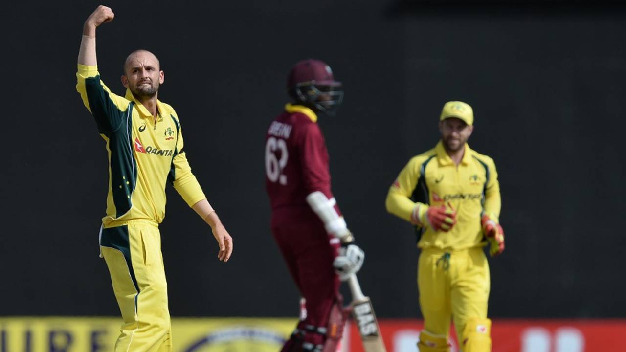 Nathan Lyon is pumped after taking a return catch, West Indies v Australia, ODI tri-series, 2nd match, Providence, June 5, 2016