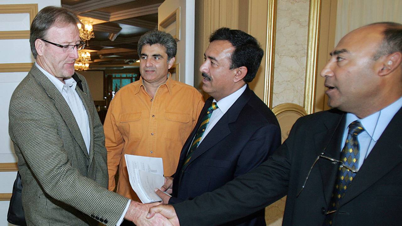 Geoff Lawson shakes hands with Mudassar Nazar after his interview for the Pakistan coaching job