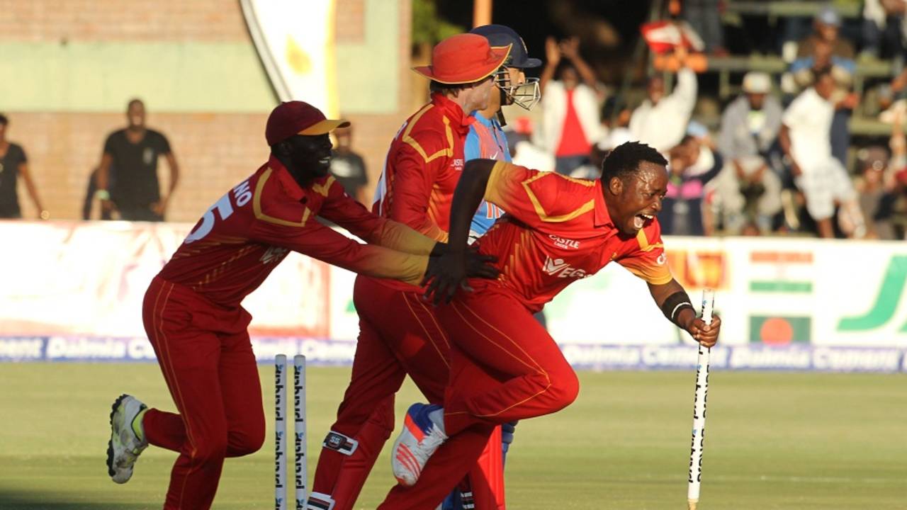 Catch me if you can: Neville Madziva takes off for a celebratory run after sealing Zimbabwe's win, Zimbabwe v India, 1st T20I, Harare, June 18, 2016