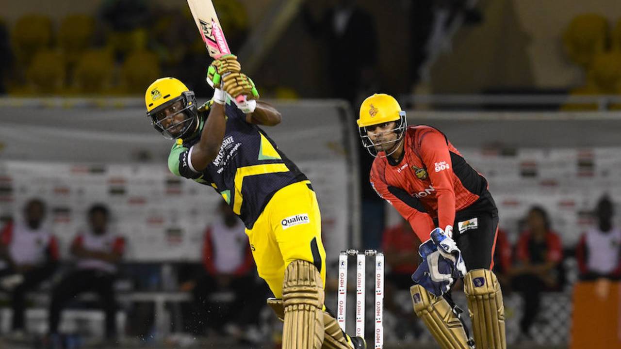 Andre Russell drives down the ground, Trinbago Knight Riders v Jamaica Tallawahs, CPL 2016, Port of Spain, July 4, 2016