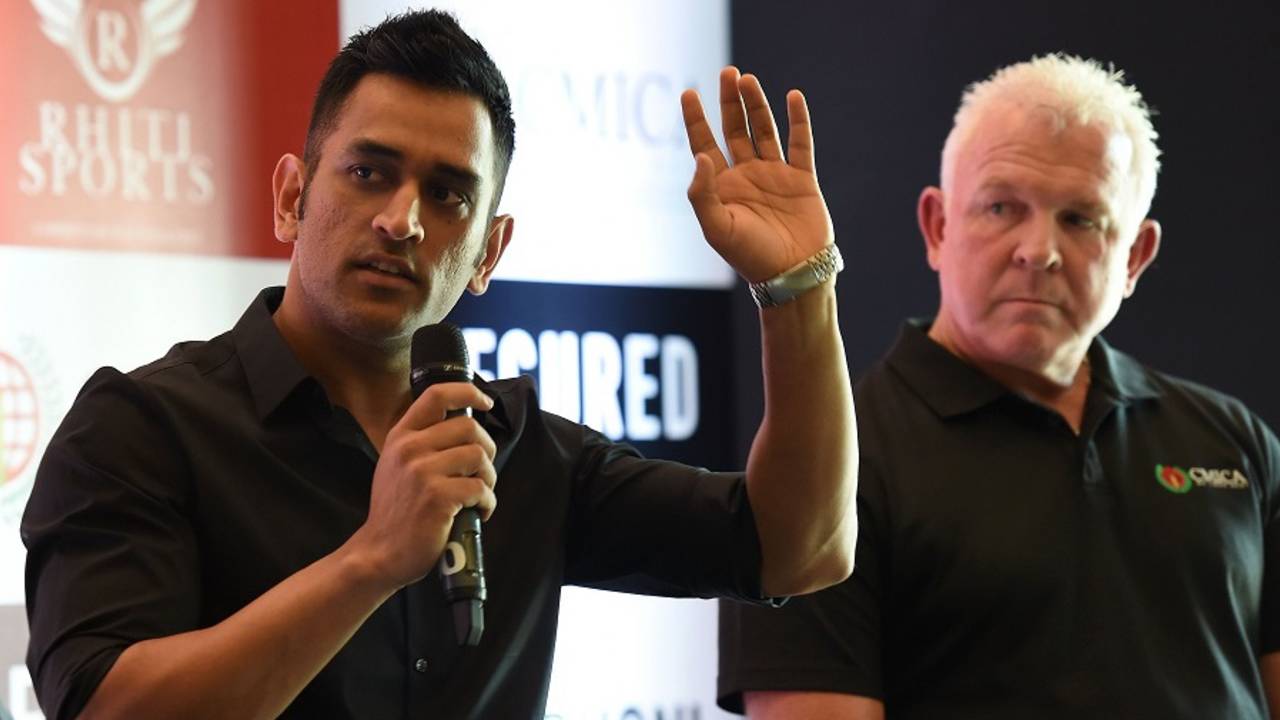 MS Dhoni with Craig McDermott at a promotional event in Delhi, Delhi, July 20, 2016