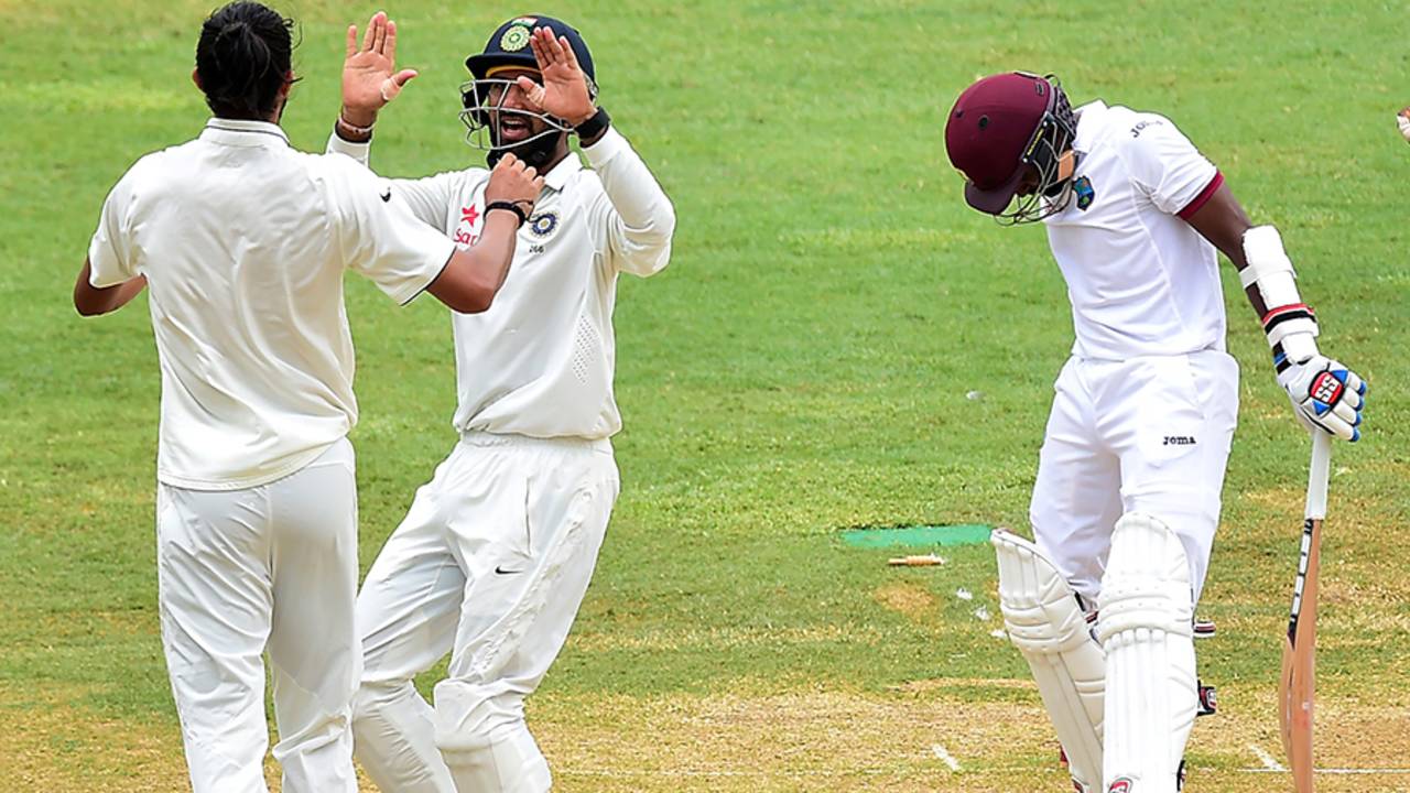 Cheteshwar Pujara and Ishant Sharma celebrate Rajendra Chandrika's dismissal, West Indies v India, 2nd Test, Kingston, 4th day, August 2, 2016