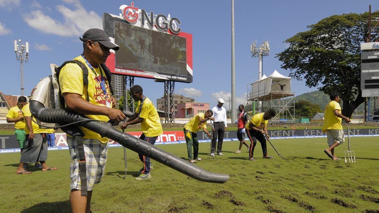 Ground staff at Queen's Park Oval dug up the outfield in a bid to get it to dry out&nbsp;&nbsp;&bull;&nbsp;&nbsp;AFP