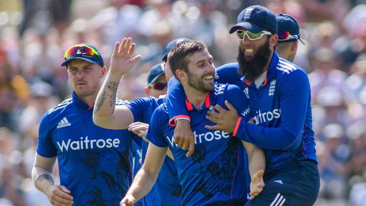Mark Wood was mobbed by his team-mates after striking on his England comeback, England v Pakistan, 1st ODI, Ageas Bowl, August 24, 2016